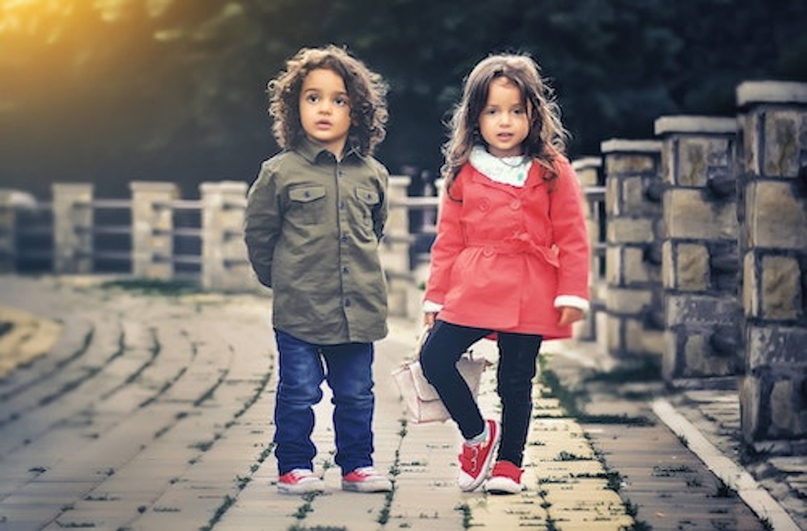 two children on a bridge