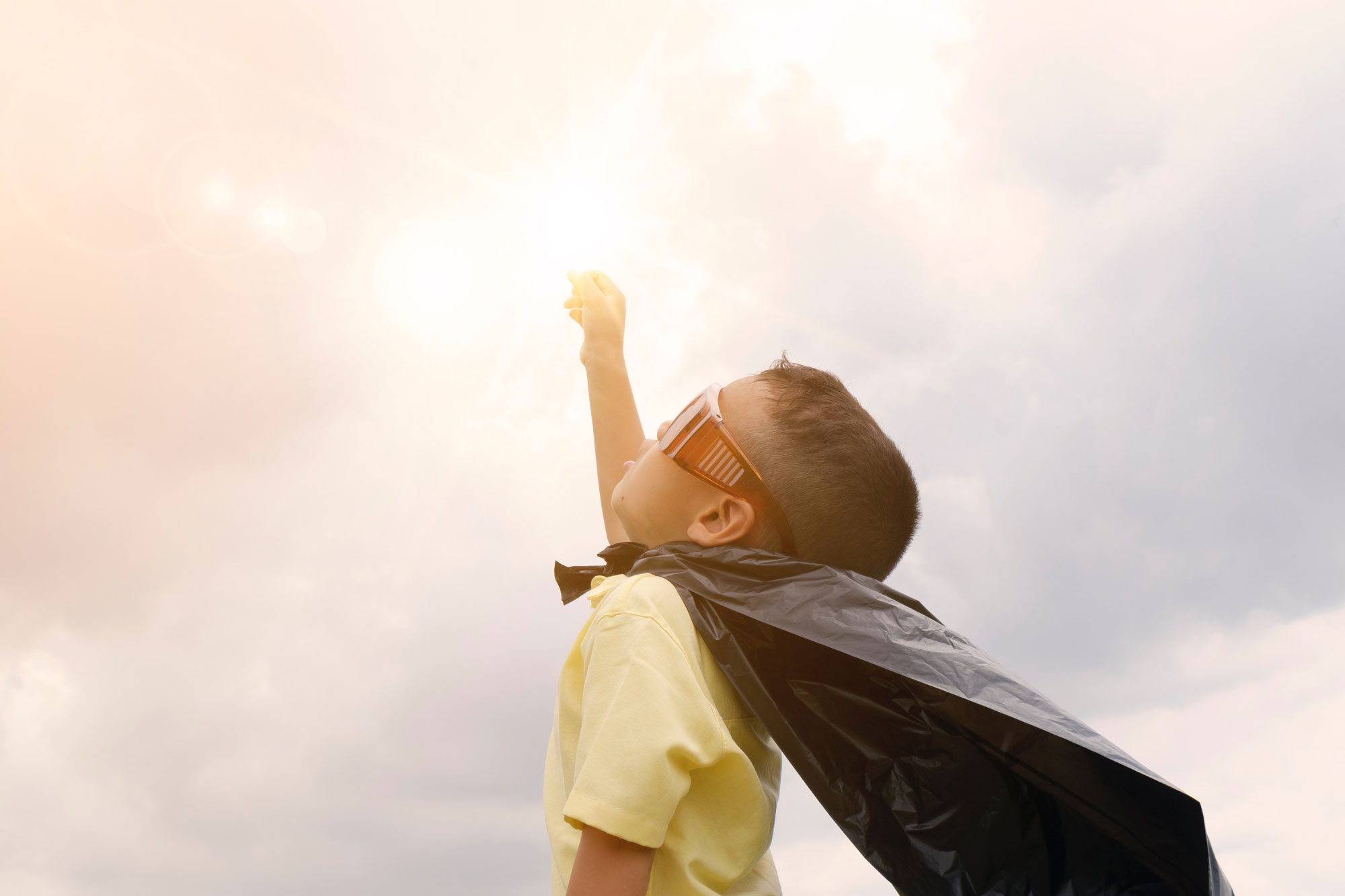 child in a superhero costume