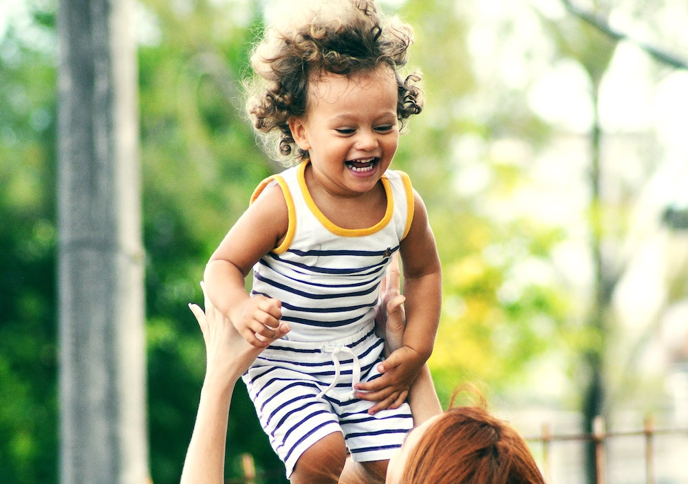 child being raised by parent