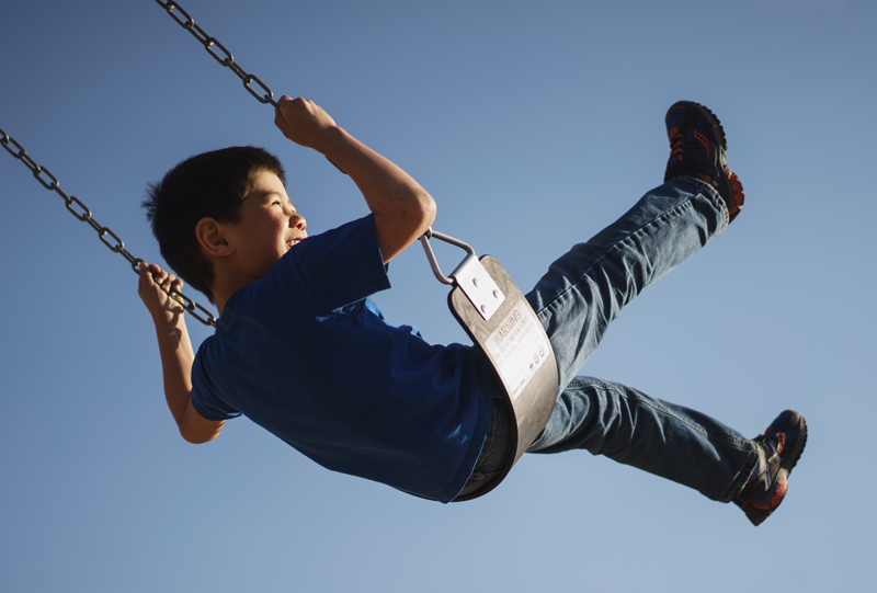 child on swing