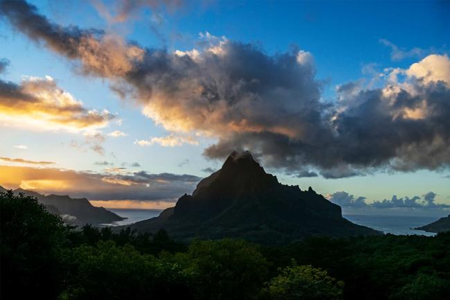 mountain peak with dark skies