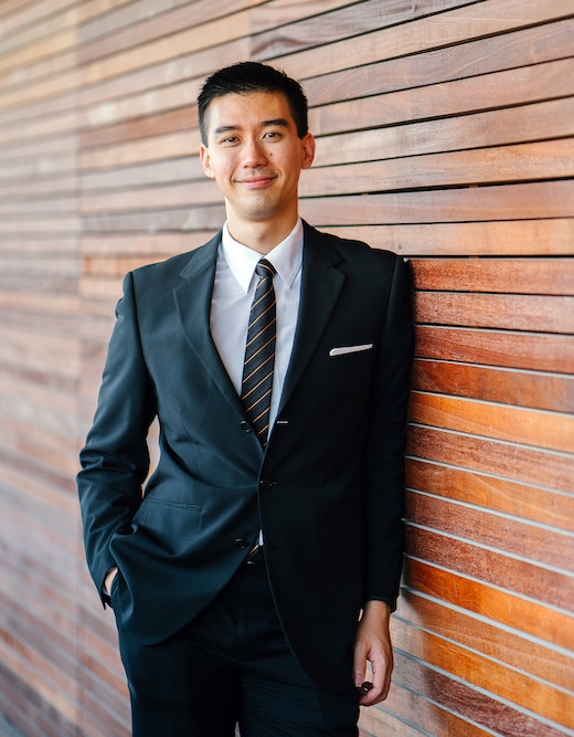 student wearing a suit and tie